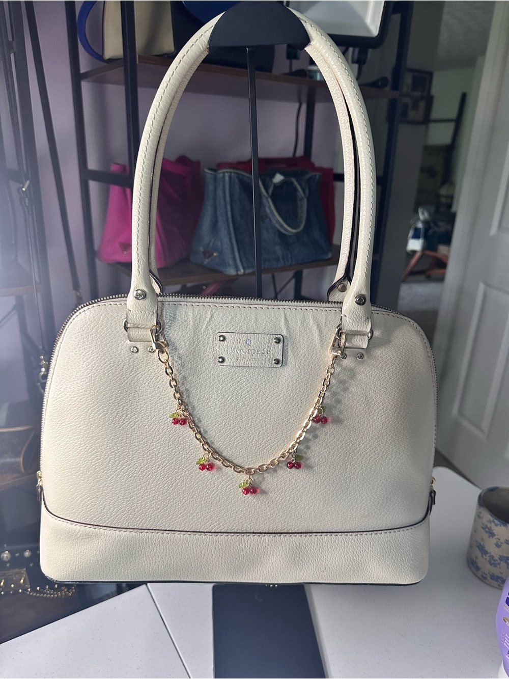 kate spade Cream Pebbled Leather Dome Satchel with Cherry Charm